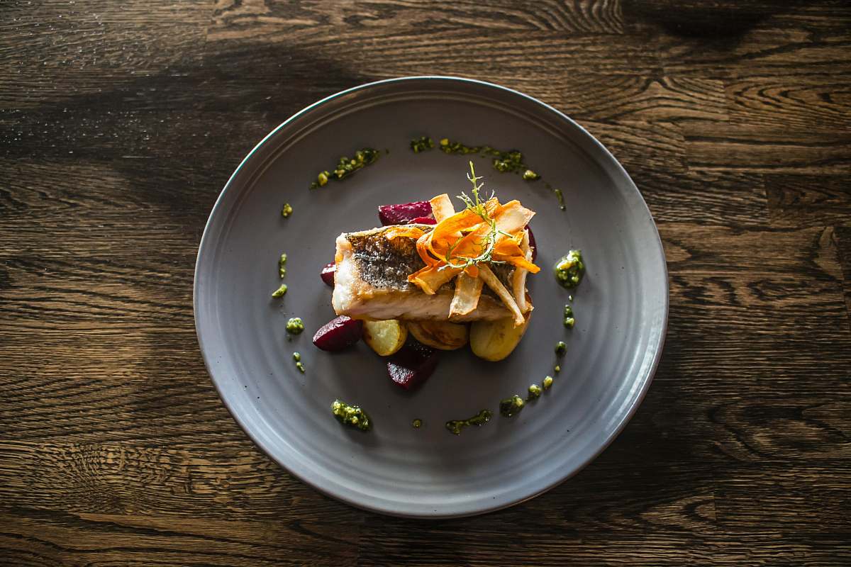 sea bass round gray plate with cooked food claremorris